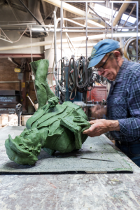 Alan Somerville detailing wax sculpture